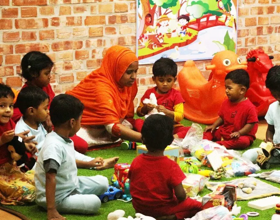 Children playing with donated toys